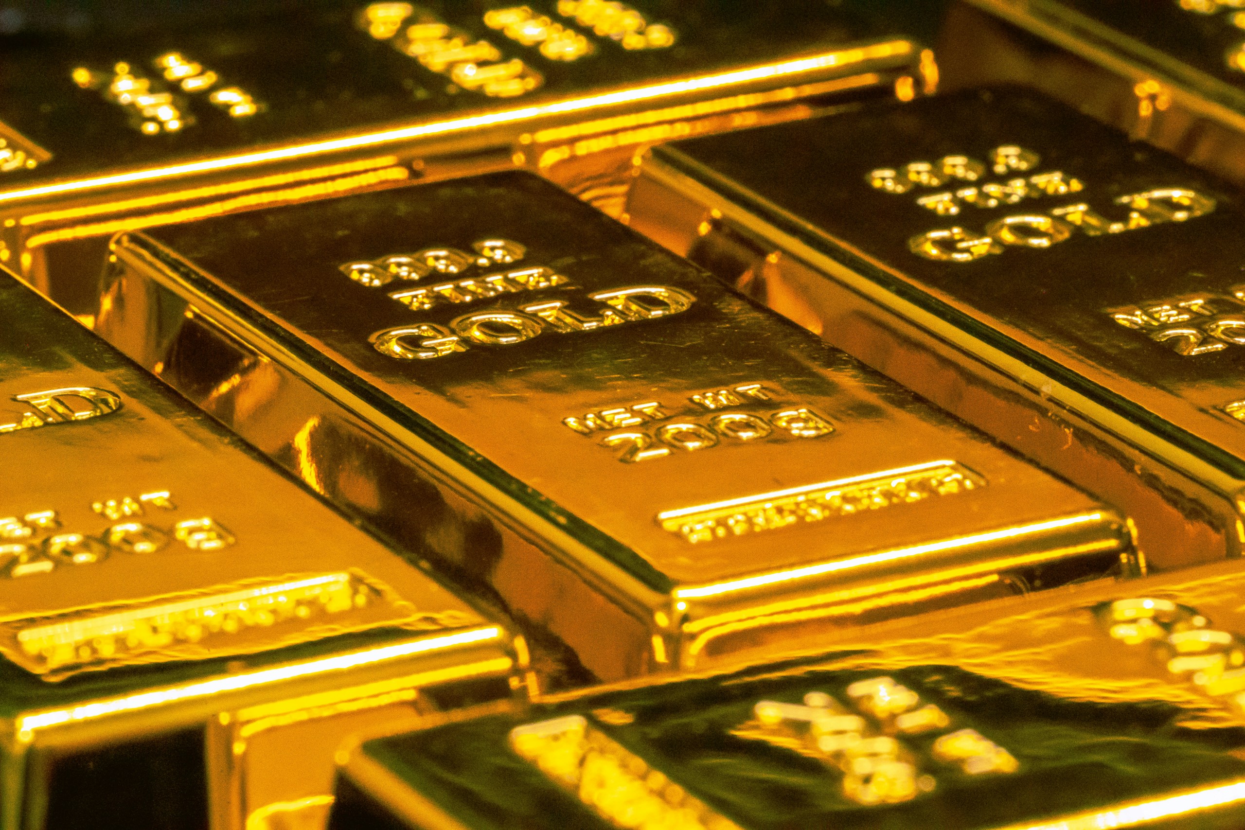 Gold bars in a secure vault representing central-bank reserves held in London
