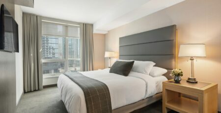 Modern hotel building illustrating hotel room investment