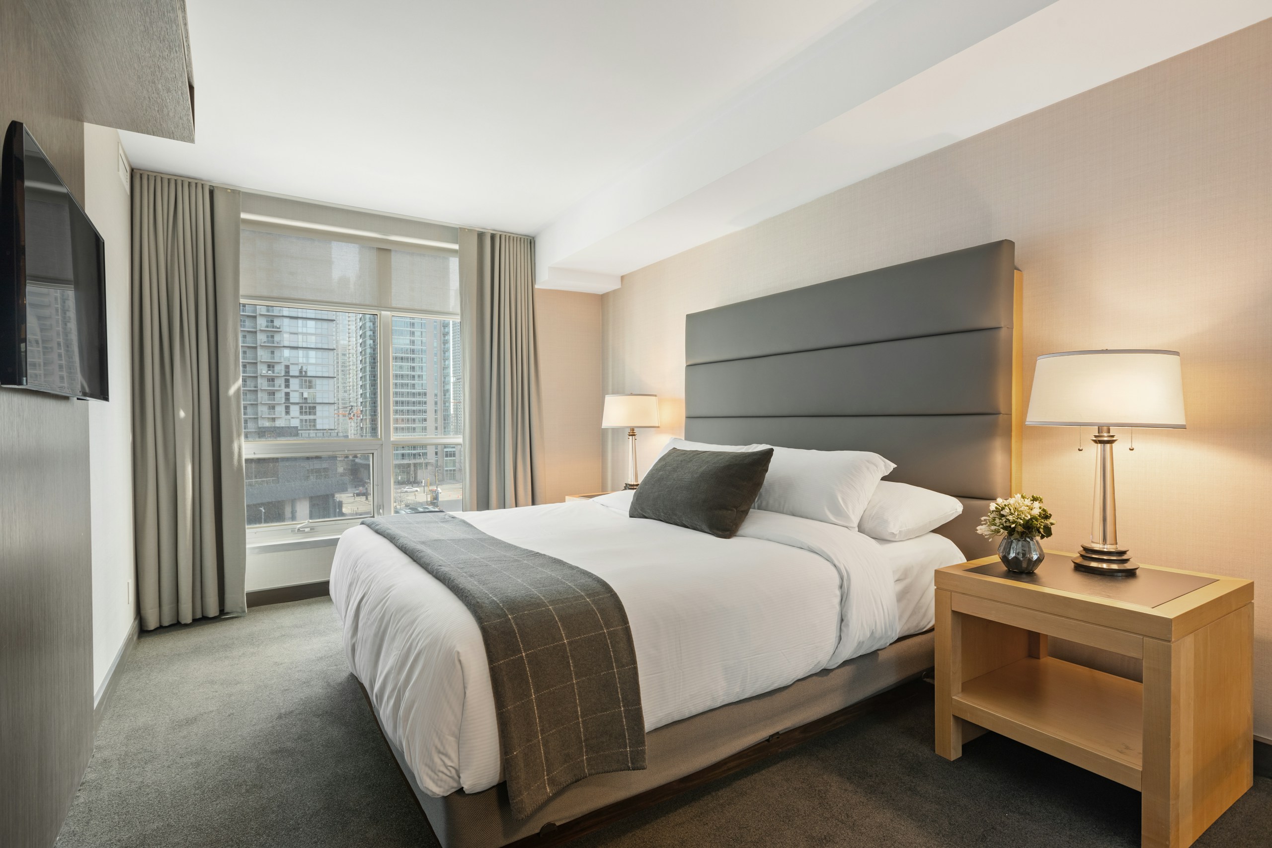 Modern hotel building illustrating hotel room investment