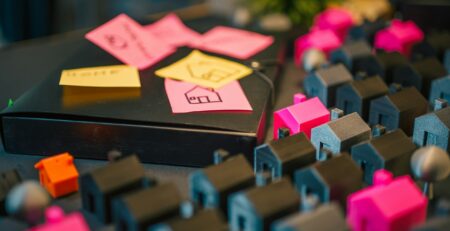 - Property investor discussing research with a property mentor