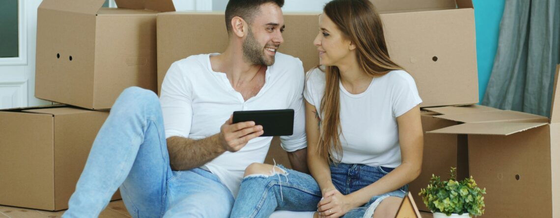 First-time buyers outside a new-build home under the Your First Home scheme